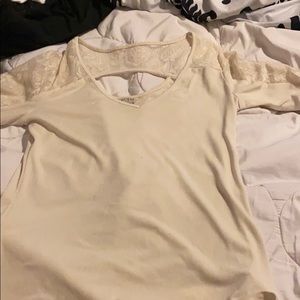 A cream long sleeve shirt